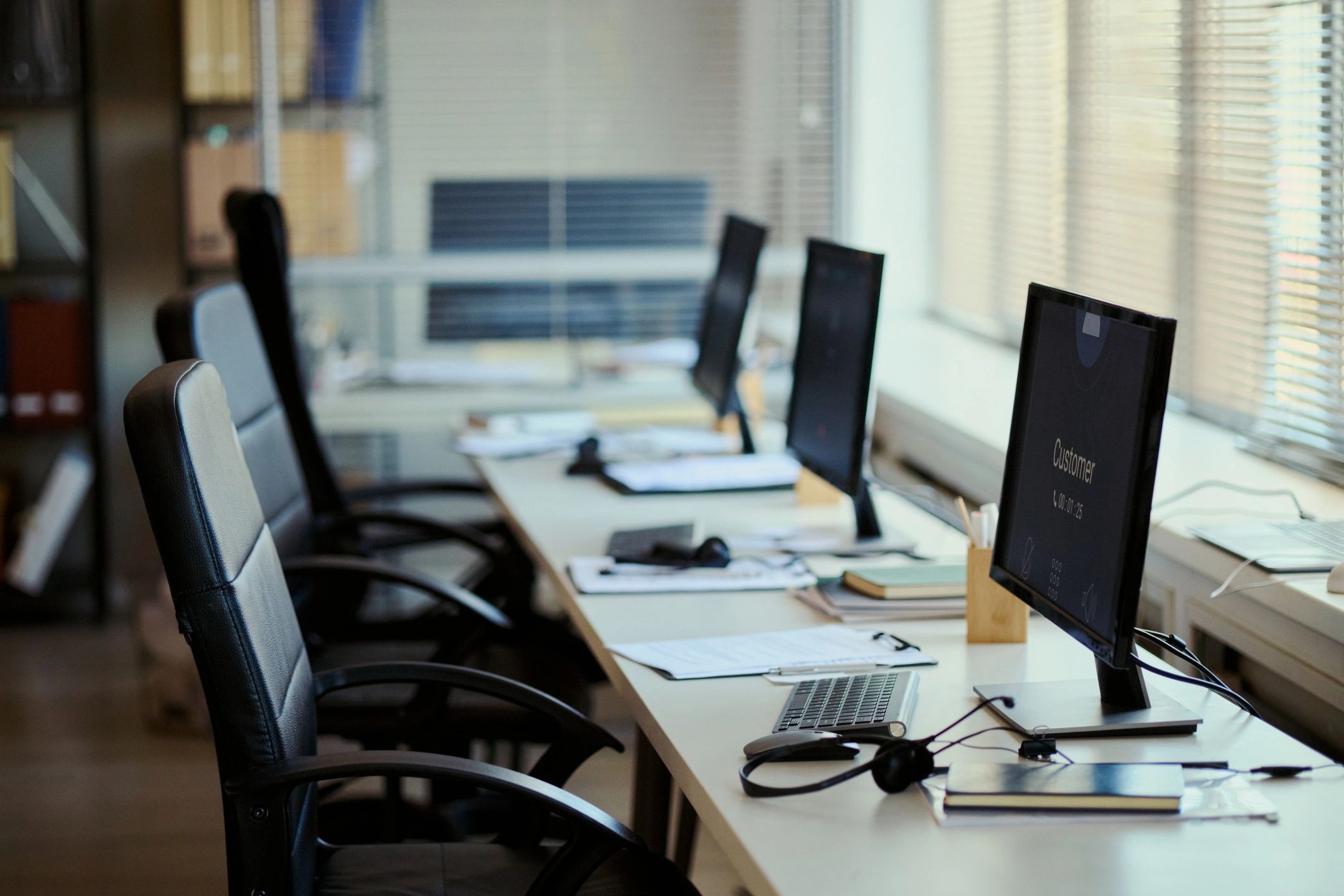 Professional workstation environment representing digital communications